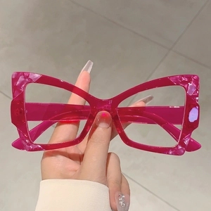 Fashionable oversized butterfly cat-eye sunglasses in translucent rose pink acetate frame