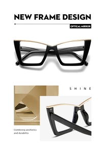 Detail der Cateye-Brille mit schwarzem Rahmen und goldenen Metall-Akzenten