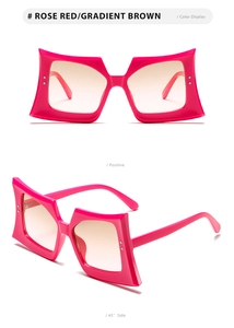 Oversized rose red butterfly sunglasses with gradient brown lenses and metal rivets