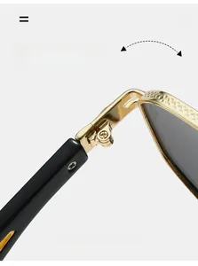 Detailed macro view of durable gold metal hinges with intricate engraved textures