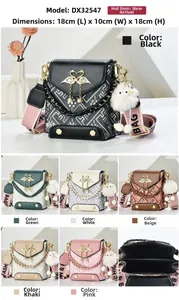 Detail view of mini crossbody phone bag showing swan buckle and wide logo strap