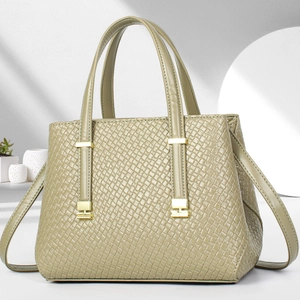 Olive green woven texture tote bag with gold hardware and shoulder strap for women