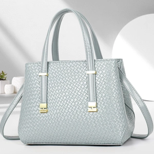 Chic silver woven texture tote bag with golden hardware and adjustable strap