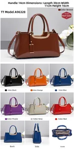 Glossy patent leather tote bag with metal handles and 30x11x16cm dimensions specs
