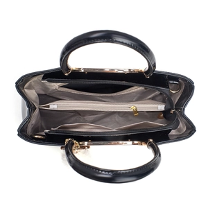Top view showing the internal structure of black patent bag with multi-layer dividers