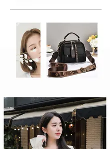 Detail of black pebbled leather handbag featuring a vintage patterned wide shoulder strap