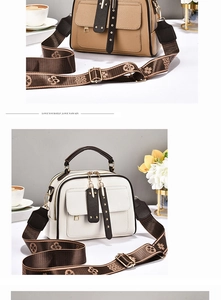 Close-up of khaki and cream leather bags with vintage rivet pockets and floral straps