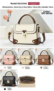 Detail view of the vintage envelope crossbody bag showing internal compartments and lock
