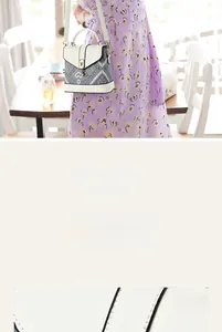 Macro detail of geometric patterned crossbody bag with metallic gold hardware clasp