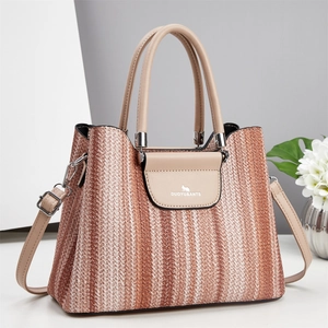 Large capacity woven tote bag with beige leather trim and adjustable shoulder strap
