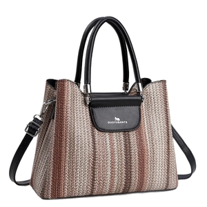 Chic commuter tote bag with color-block woven texture and premium leather handles
