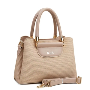 Beige woven leather tote bag with NJS logo and detachable shoulder strap in a 45-degree view