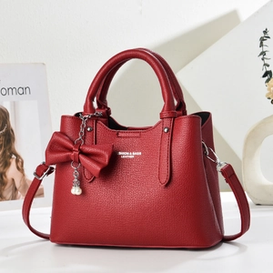 Red lychee pattern leather tote bag with pearl bow pendant and detachable shoulder strap