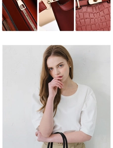 Détails de la texture crocodile rouge et des ferrures dorées sur un sac à main femme