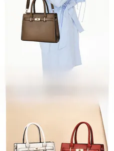 Détail de sacs à main en cuir grainé avec fermoirs rotatifs dorés en marron et rouge