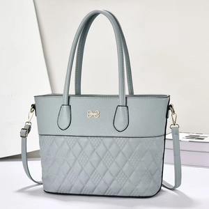Sac fourre-tout vintage bleu gris en cuir matelassé avec logo doré et bandoulière