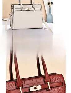 Détails de texture litchi blanc et croco marron sur des sacs à main élégants