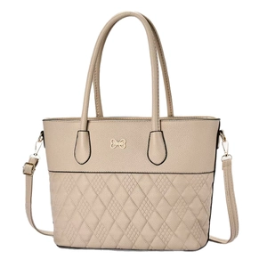 Sac fourre-tout beige en cuir matelassé avec fermoir papillon doré et bandoulière
