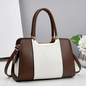 Chic two-tone faux leather handbag with snakeskin texture and gold hardware details