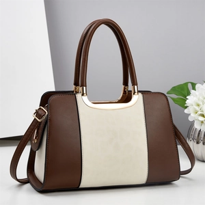 Fashion leopard color-block handbag in brown and cream leather with gold hardware