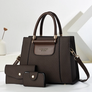 Three-piece dark brown woven tote bag set with golden hardware and adjustable strap