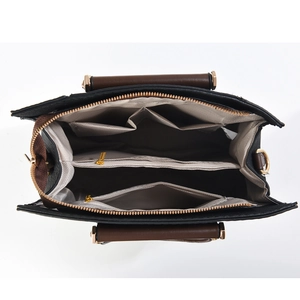 Detail view of large shoulder bag interior with multi-compartment storage and gold hardware