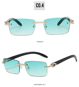 Detail of rimless blue-green gradient sunglasses with rhinestone-encrusted gold hinges