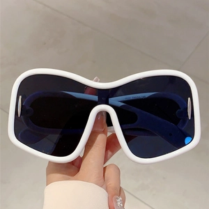 Y2K futuristic oversized white frame sunglasses with dark lenses for fashion street style