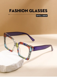 Detail of fashion glasses featuring colorful geometric patterns and purple translucent temples