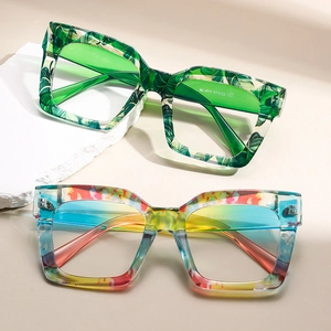 Fashionable oversized blue light glasses with colorful floral frames and tinted lenses
