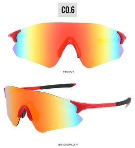 Close-up of red sports sunglasses with iridescent mirrored lenses and sleek wrap design