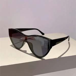 Oversized one-piece shield sunglasses with wavy top frame in sleek midnight black finish