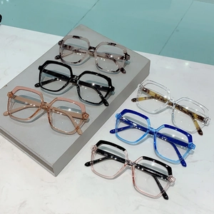 Fashionable oversized square glasses frames in six assorted colors on marble background