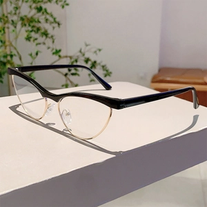 Detailed side view of cat-eye frames with black upper and gold metal semi-rimless design
