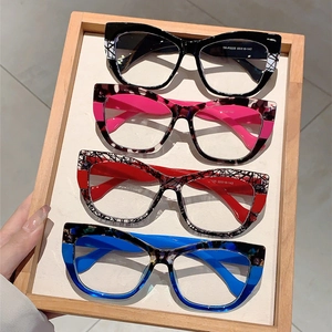 Cat eye blue light blocking glasses in black-white, pink leopard and blue tortoiseshell