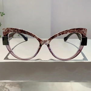 Detail showing the cat-eye frame with marble texture and lavender transparent bottom