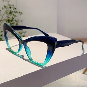 Detailed side view of cat eye glasses with blue to green gradient resin frames