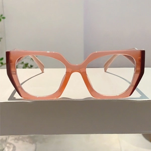 Detail view of pink translucent polygon frames with high gloss finish and geometric lines