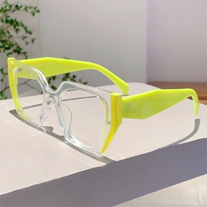 Detail of neon green temples and transparent polygon frame blue light glasses