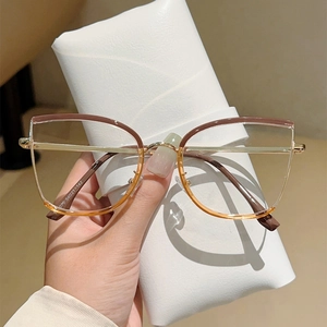 Brown cat-eye anti-blue light glasses with gold metal temples and gradient frame