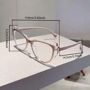 Detailed dimensions of pink cat eye frames with specific lens and temple measurements