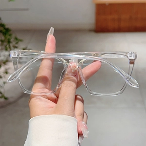 Close-up of transparent blue light blocking glasses with vintage oversized resin frame