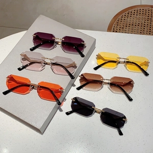 Fashionable rimless octagonal sunglasses in six colors with leopard design accents