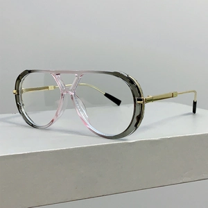 Detail of gradient oversized pilot glasses with double bridge and golden metal temples