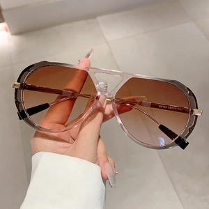 Vintage pilot sunglasses with leopard print frame and brown gradient lenses for round faces