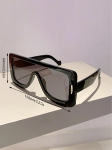Detailed size view of futuristic oversized sunglasses with 150mm width and 64mm height