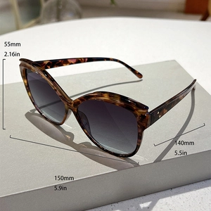 Detailed dimensions of butterfly frame sunglasses with tortoiseshell pattern and gradient lenses