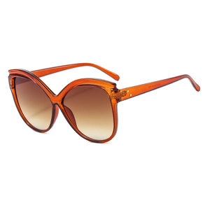 Fashionable amber butterfly frame sunglasses with brown gradient lenses for women