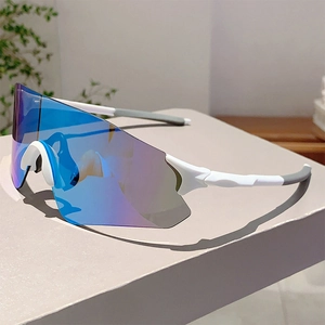 Side view of white sports sunglasses with blue-purple gradient lenses on a minimalist desk