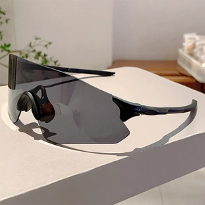 Detail of matte black athletic frames and dark grey wraparound sports lenses
